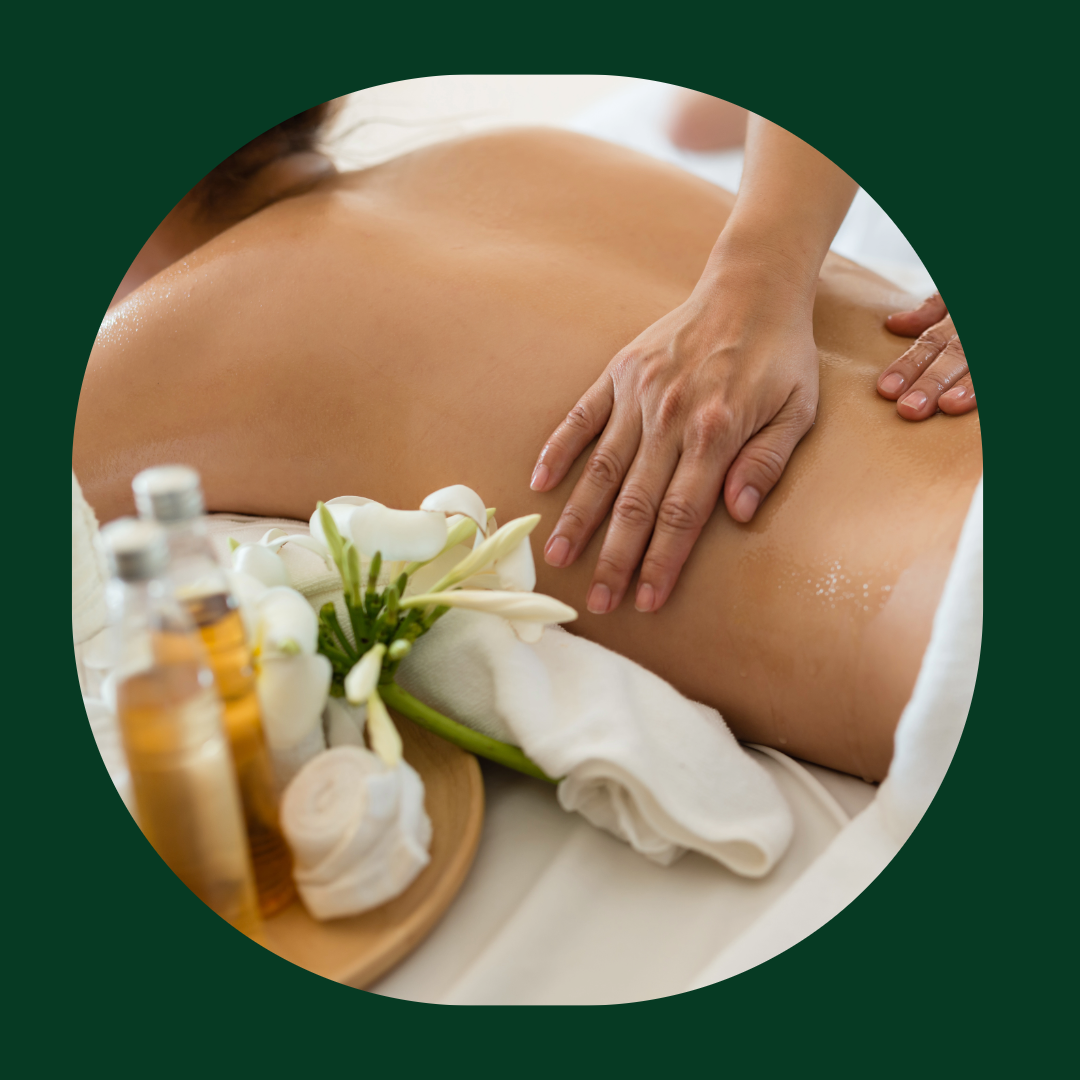 A person receiving a back massage during a spa treatment.