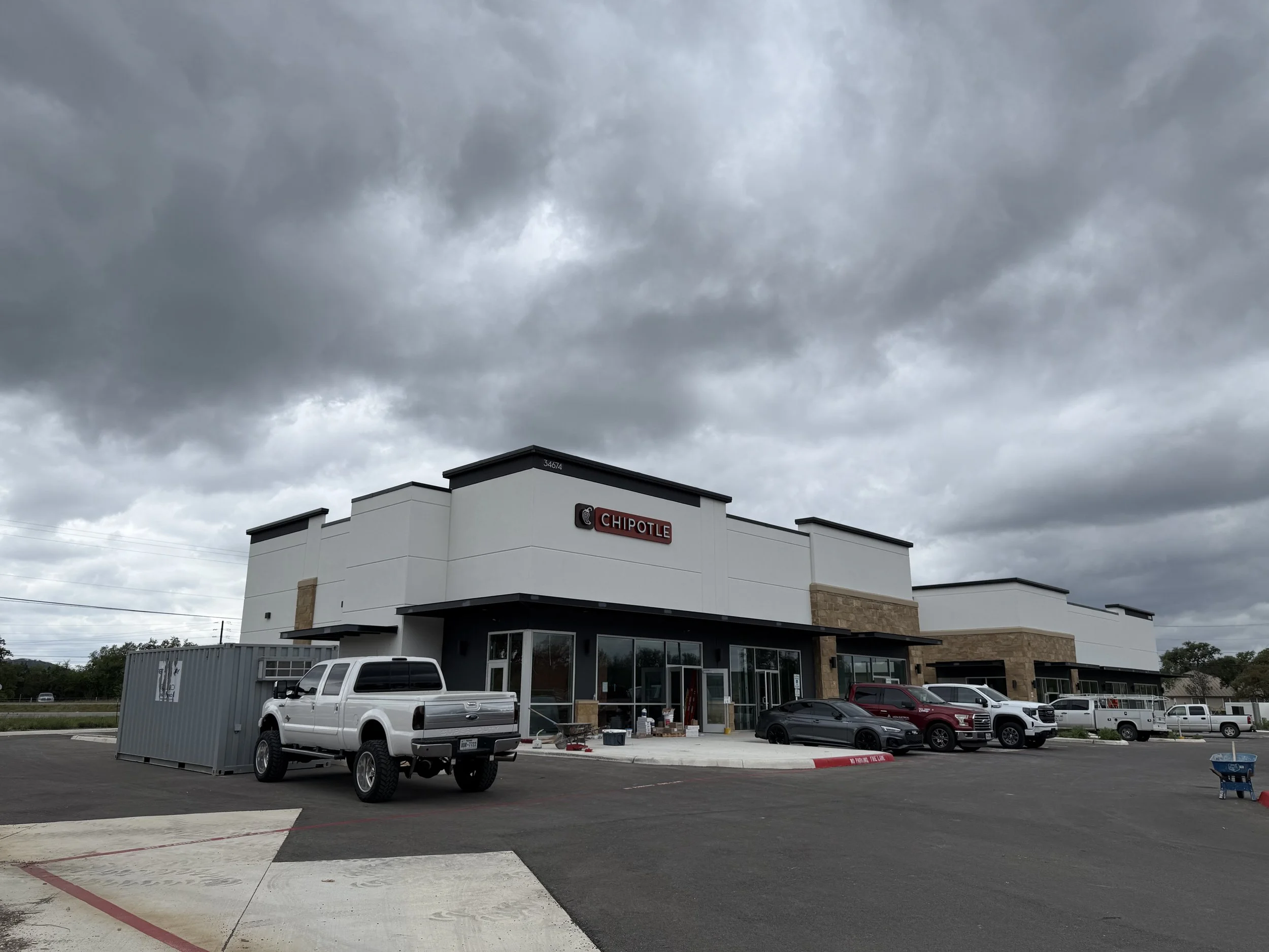 Commercial electrical project at restaurant buildout in San Antonio shopping center
Electrical contractor work at retail strip center including restaurant tenant finish-out
Chipotle restaurant electrical installation project by Axiom Electrical Solut