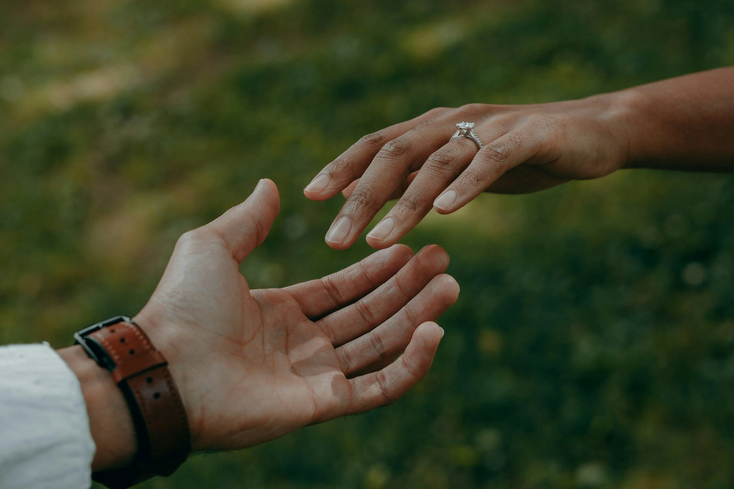 Two hands reaching toward one another, symbolizing support, connection, and the healing relationship at the heart of East Bay therapy in Orinda, CA.