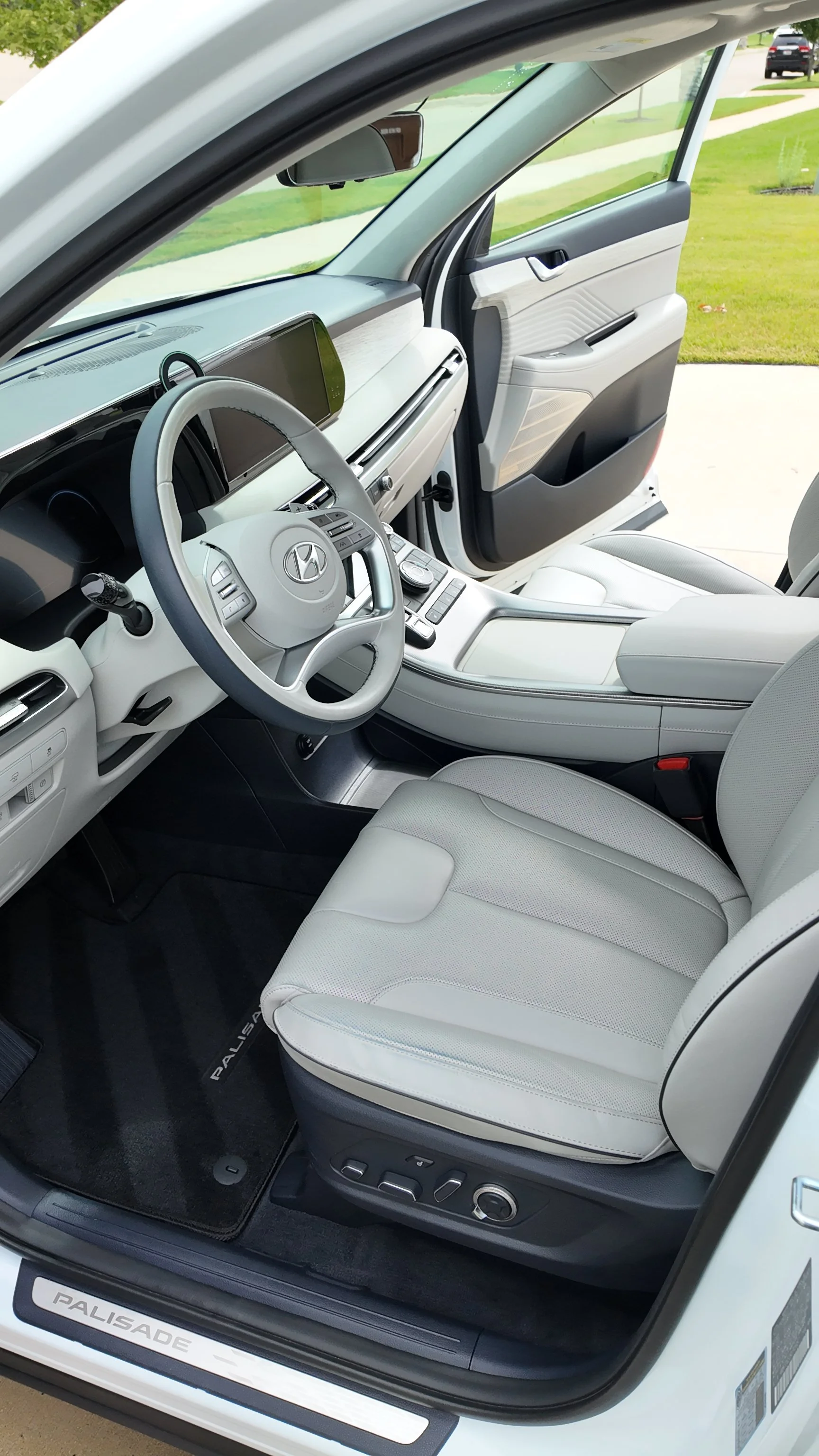 "Full interior restoration of a family-driven Hyundai Palisade in Okemos, including deep carpet extraction and salt removal from all three rows.