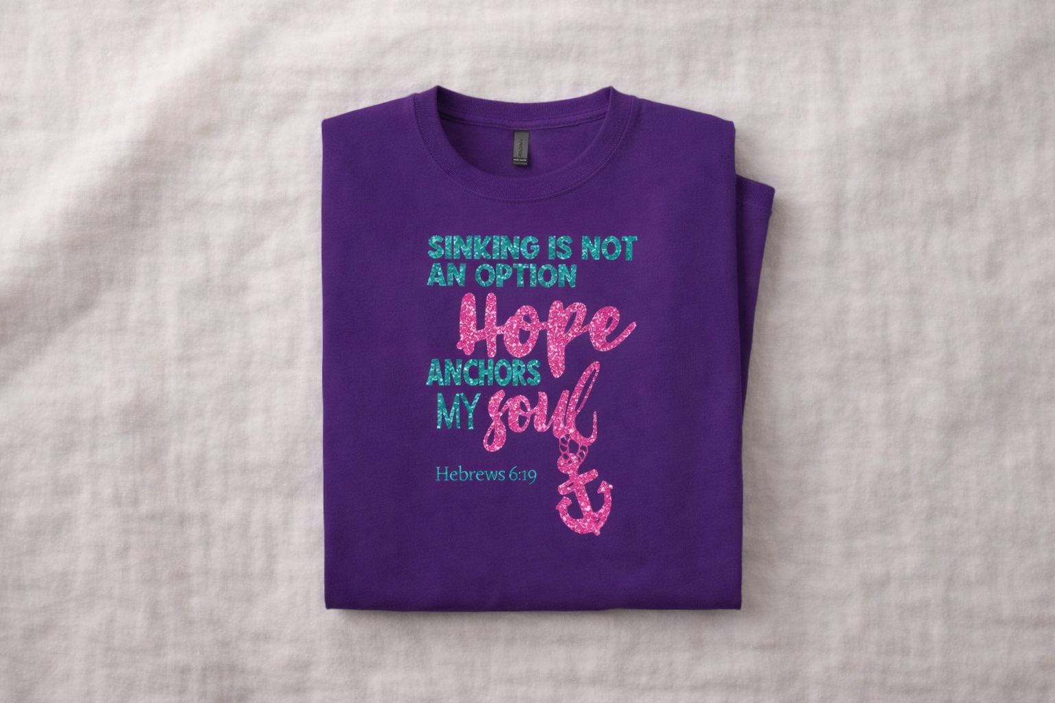 PURPLE_Scripture_Tee_FoldedFlatlay.png