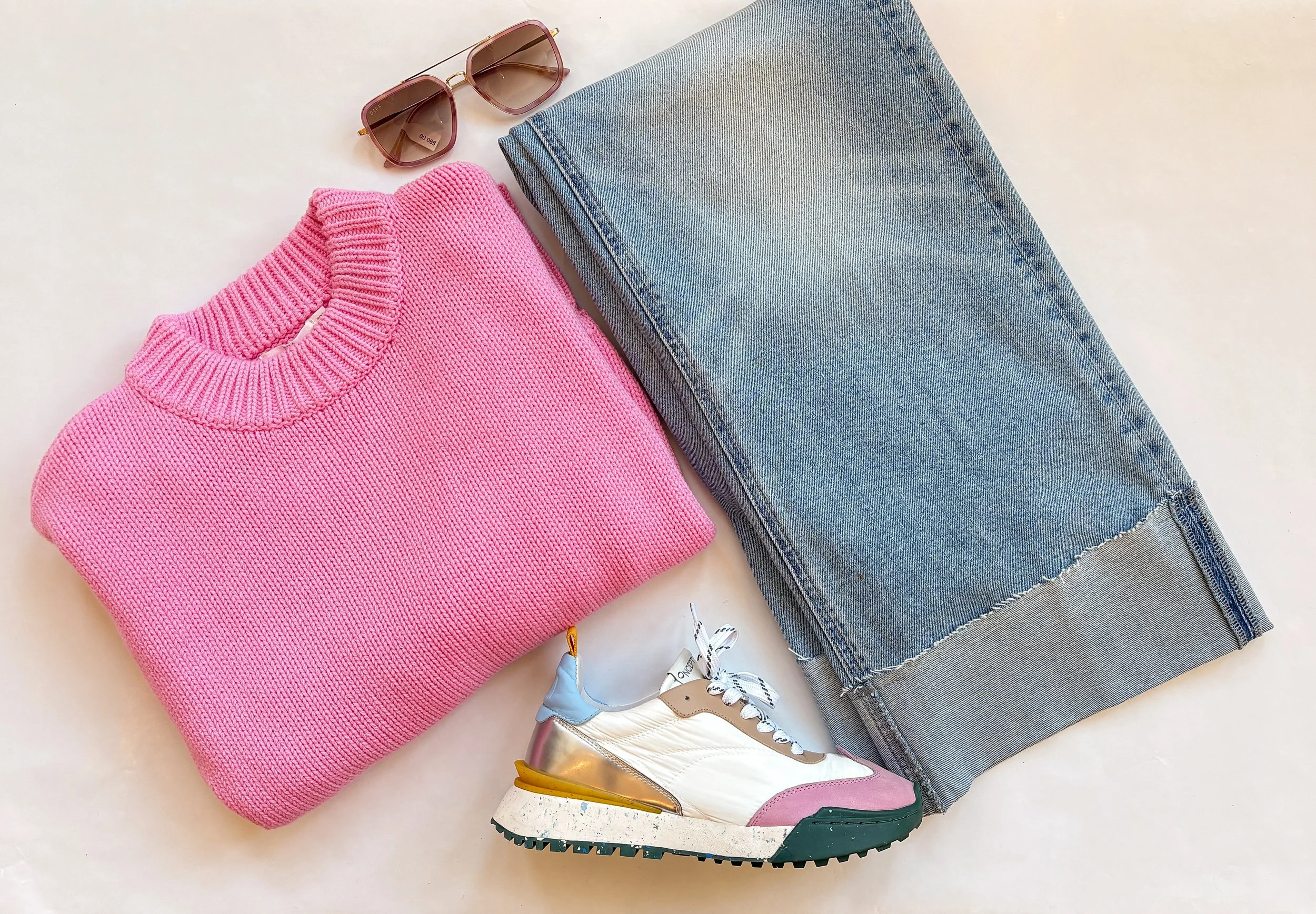 🤸‍♀️🫧🍬✨

Feeling fun and funky in this pink knit, wide leg jean, oncept sneaker, & these cool shades.