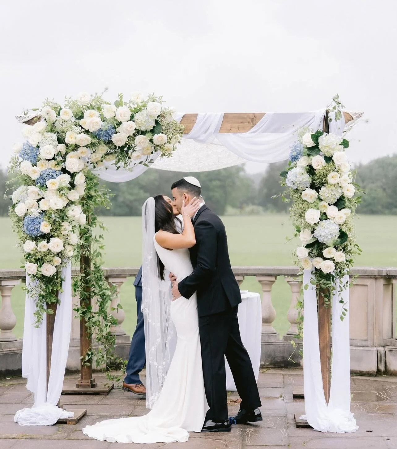 A moment sealed with love beneath the blooms. So honored to design this dreamy floral arch for a day full of joy, elegance, and forever.

Venue: @great.marsh
Planning &amp; Design: @terrykayeevents
Photography: @nikkisanterre
Videography: @afineartwe