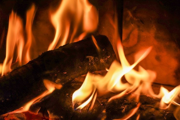 Warm burning wood for winter indoors or outdoors