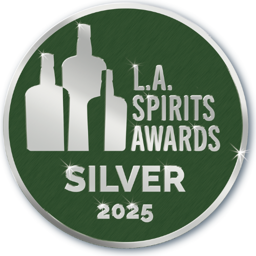 Silver award badge for the 2025 L.A. Spirits Awards featuring three silver bottles on a green background.