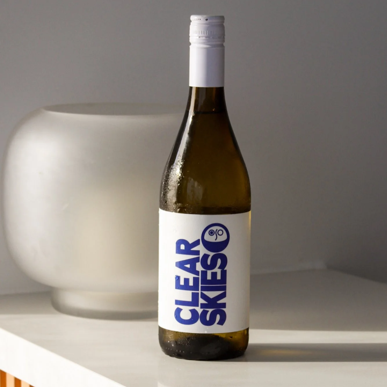 CLEAR SKIES - Full-bodied, lively, and bright. Notes of melon, green grape, honeycomb, and apple. Soft with a savory finish. Pour alongside tacos, pizza, fried chicken, seafood, or anything off the grill. Works everywhere a crisp white wine does, and