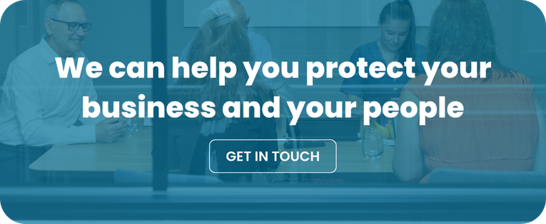 Howardco website banner with a teal overlay showing people in a meeting. Text reads: “We can help you protect your business and your people” with a “Get in touch” button.