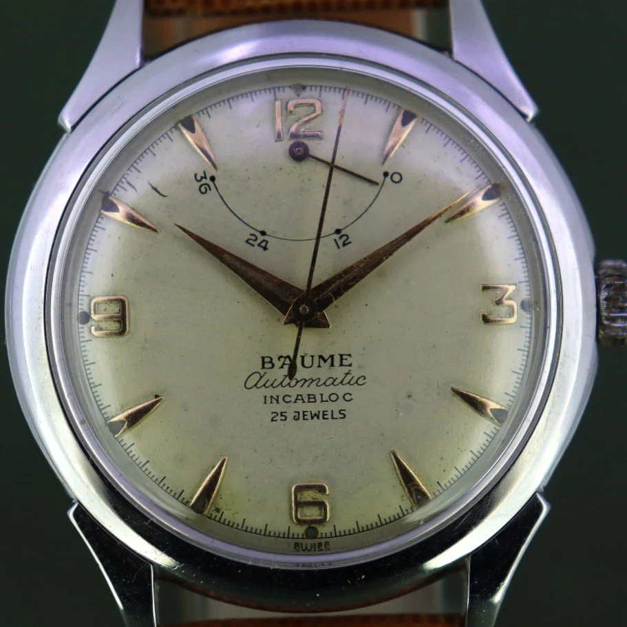 1950s Baume automatic vintage watch with power reserve.
