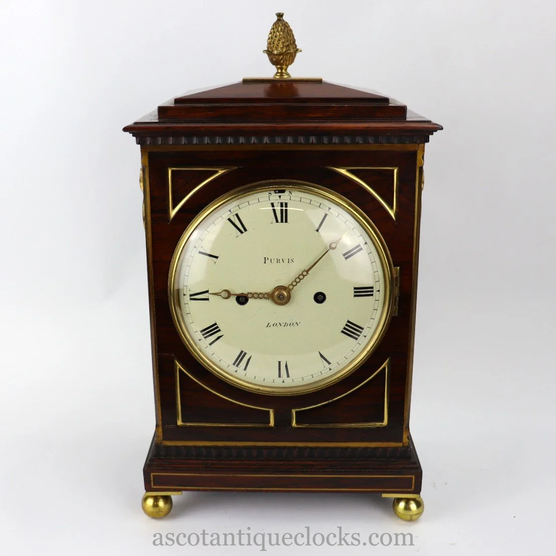 Early 19th century small size Rosewood chamfer top bracket clock by Purvis.London