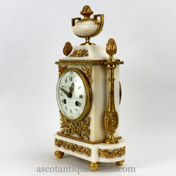 Late 19th century French white marble and ormolu clock for Le Roy.