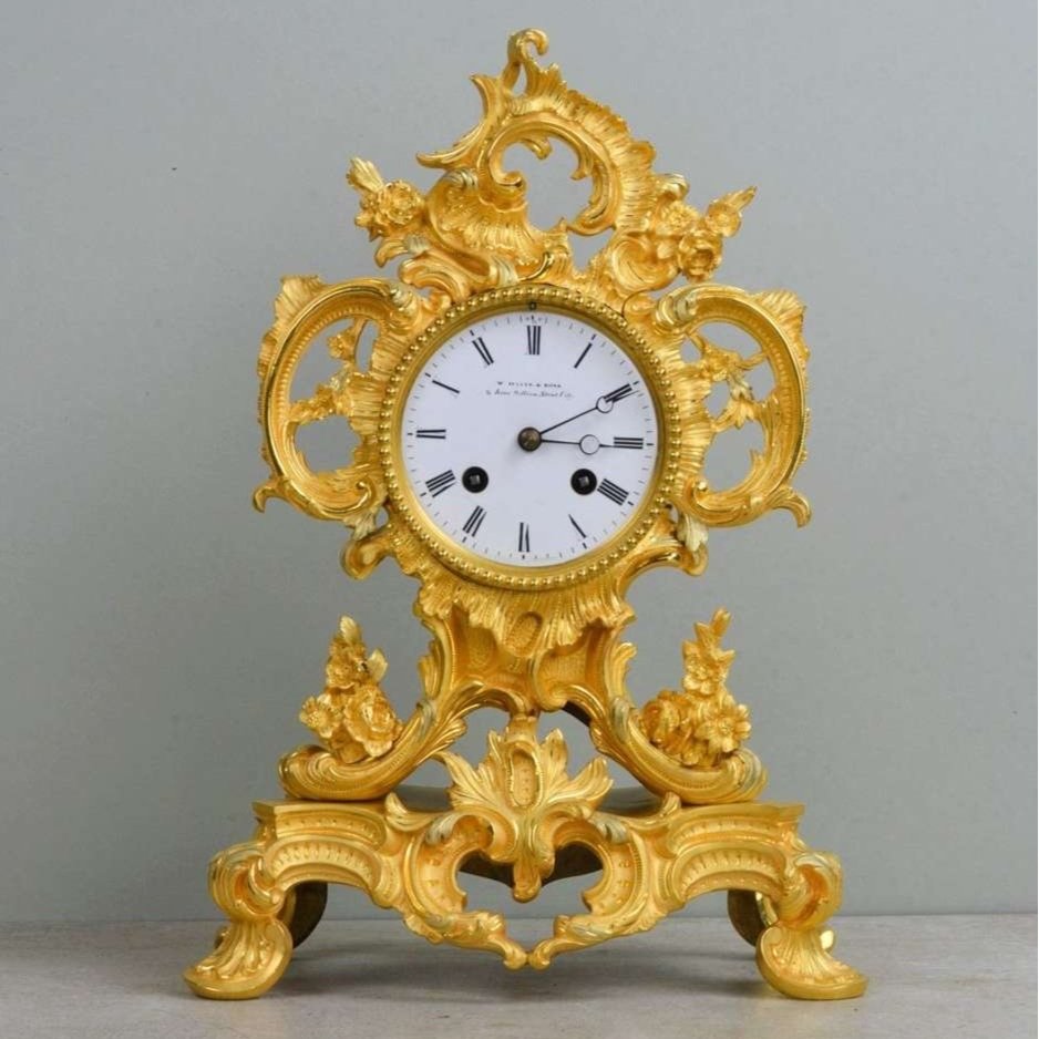 19th Century gilt ormolu Louis XIV style French clock retailed by William Davis & Sons.