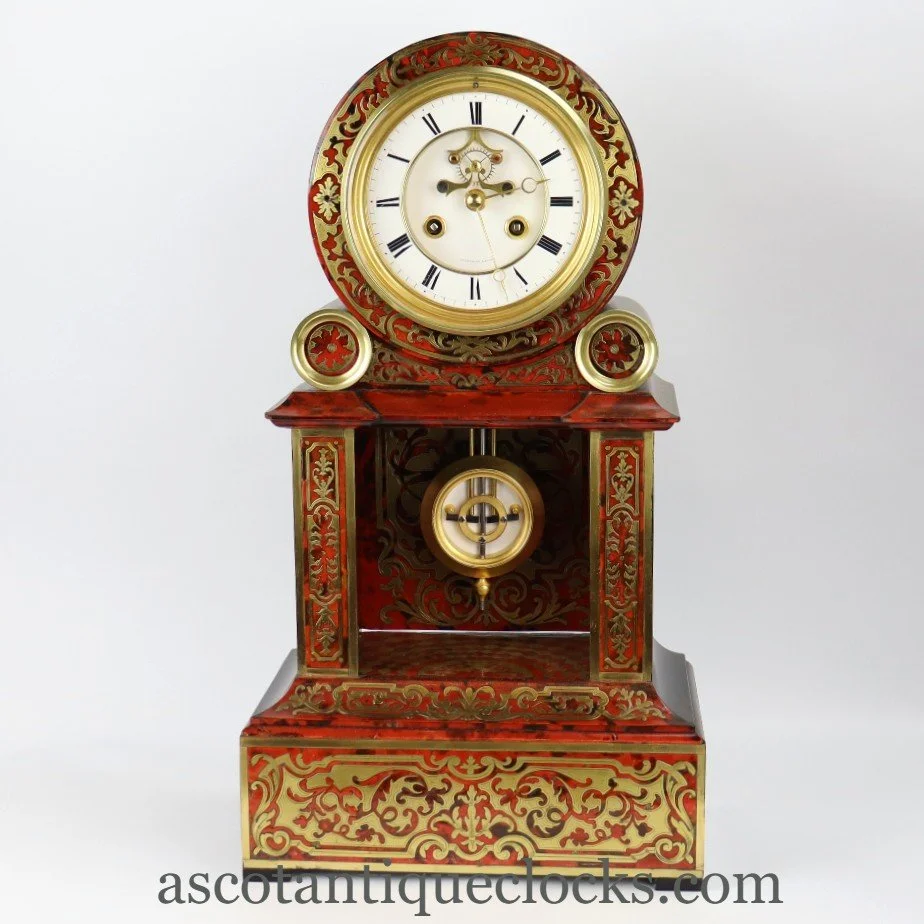 Late 19th Century red Boulle clock.