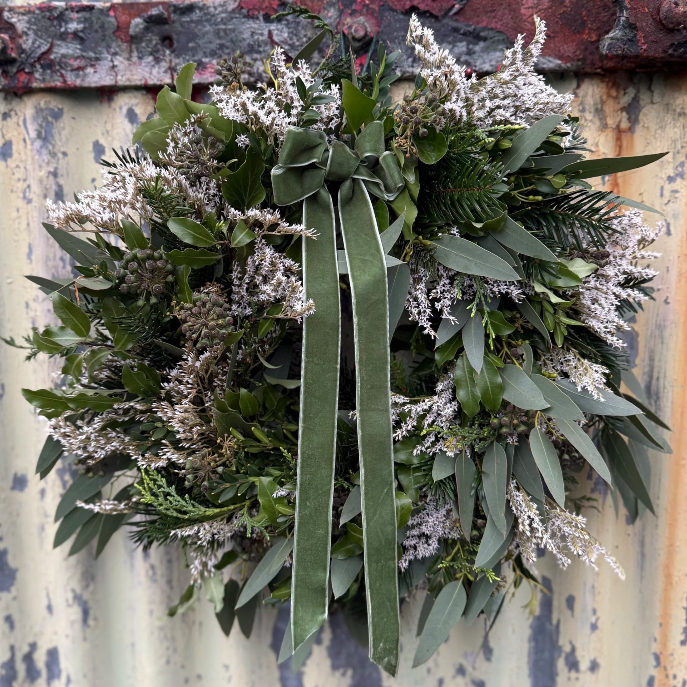 Willow wreath with British dried flowers an green foliage