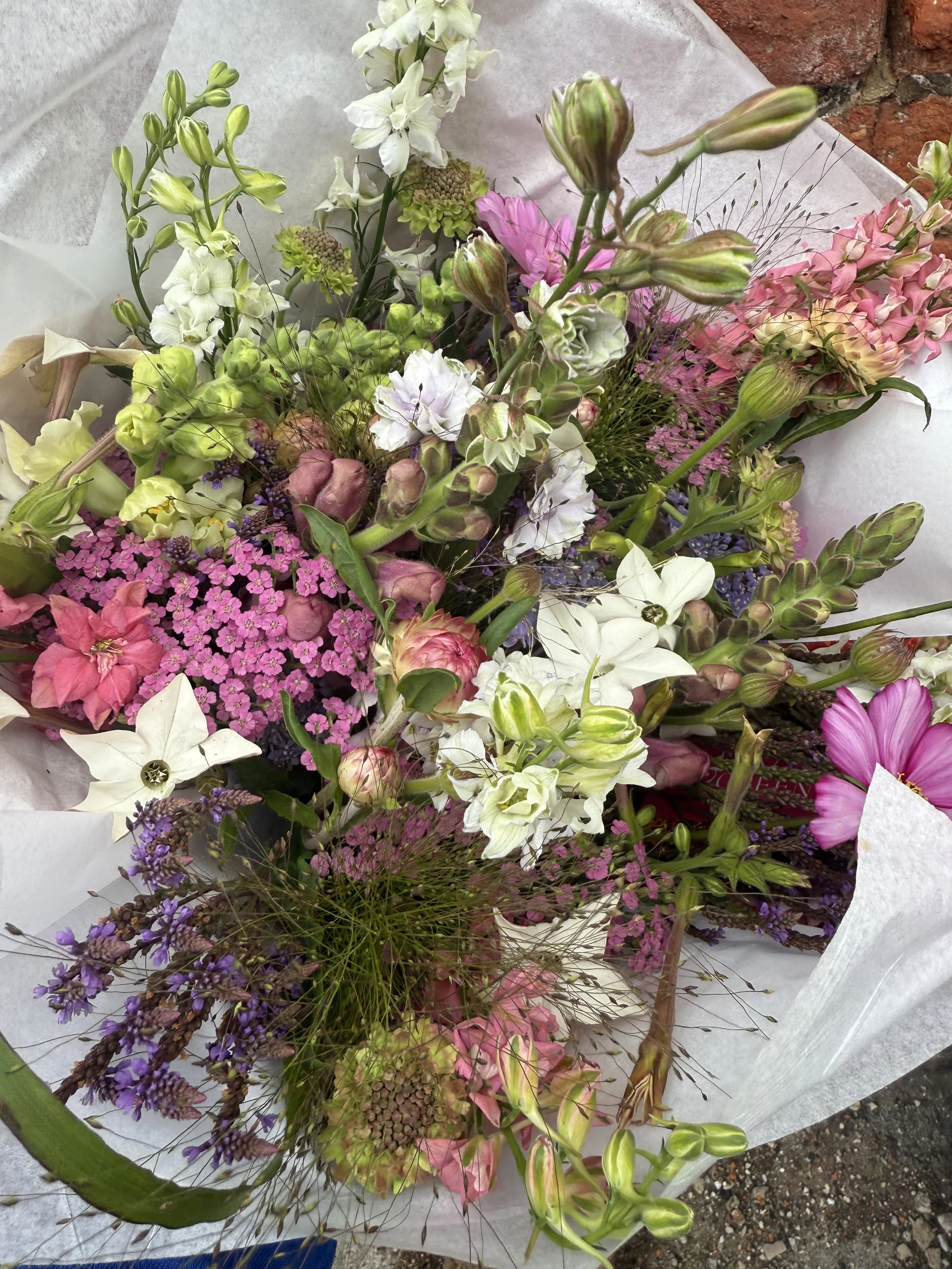 A hand-tied bouquet made with seasonal flowers grown in Cheshire