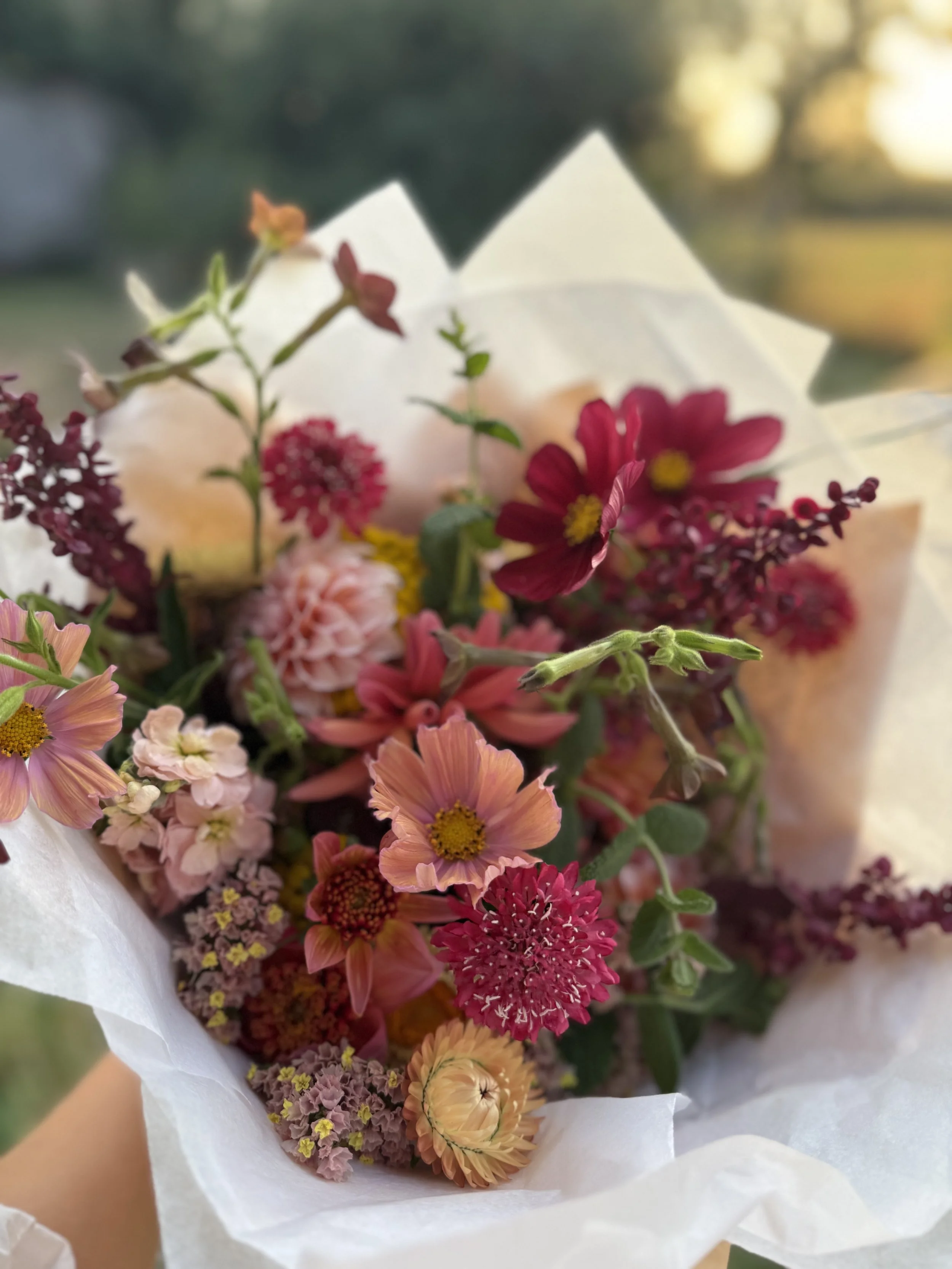 A hand-tied bouquet made with seasonal flowers grown in Britain.