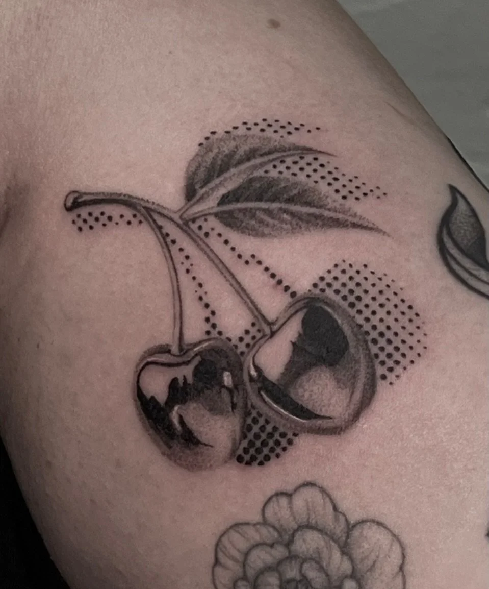 Chrome and halftone cherries from my flash. I&rsquo;d love to tattoo more pieces in this style, swipe for available flash (all repeatable except for the abstract ones, and I&rsquo;m always happy to draw something custom) 

Made at the @hamsatattoomel