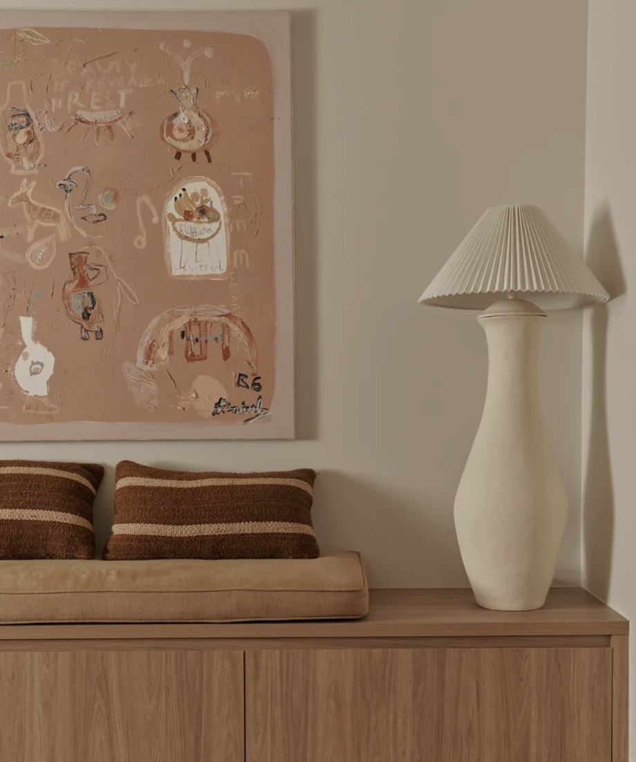 image of bench and artwork - Hallway design