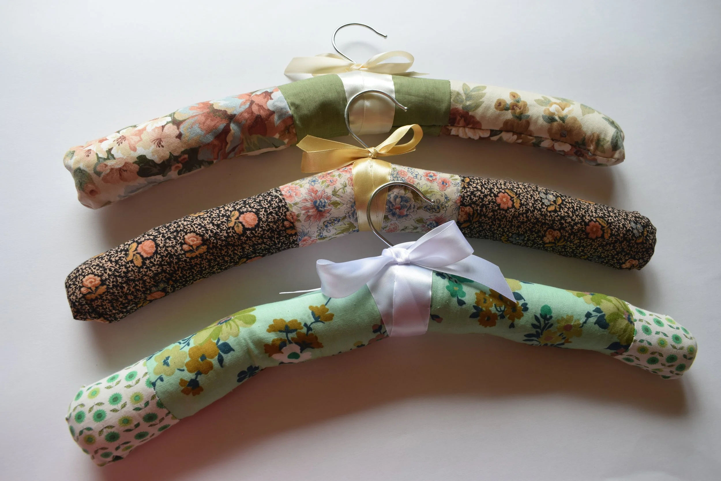 Set of 3 Hand sewn vintage fabric padded coat hangers