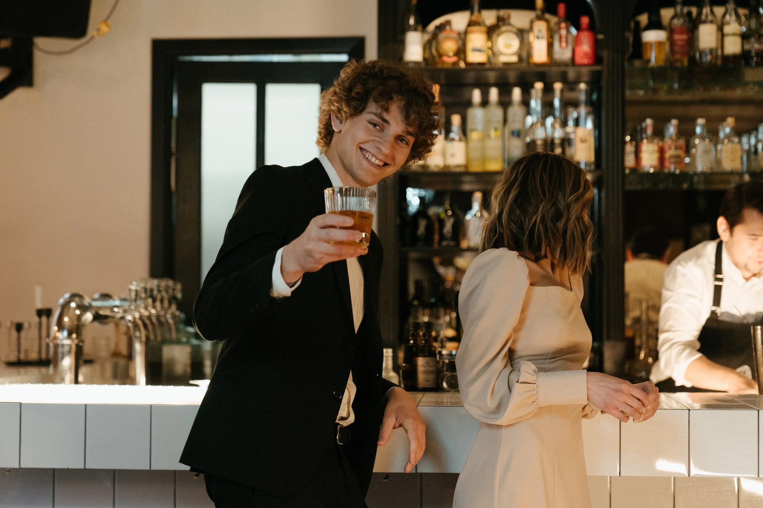 Christian singles toasting champagne at Christmas cocktail party in Brisbane