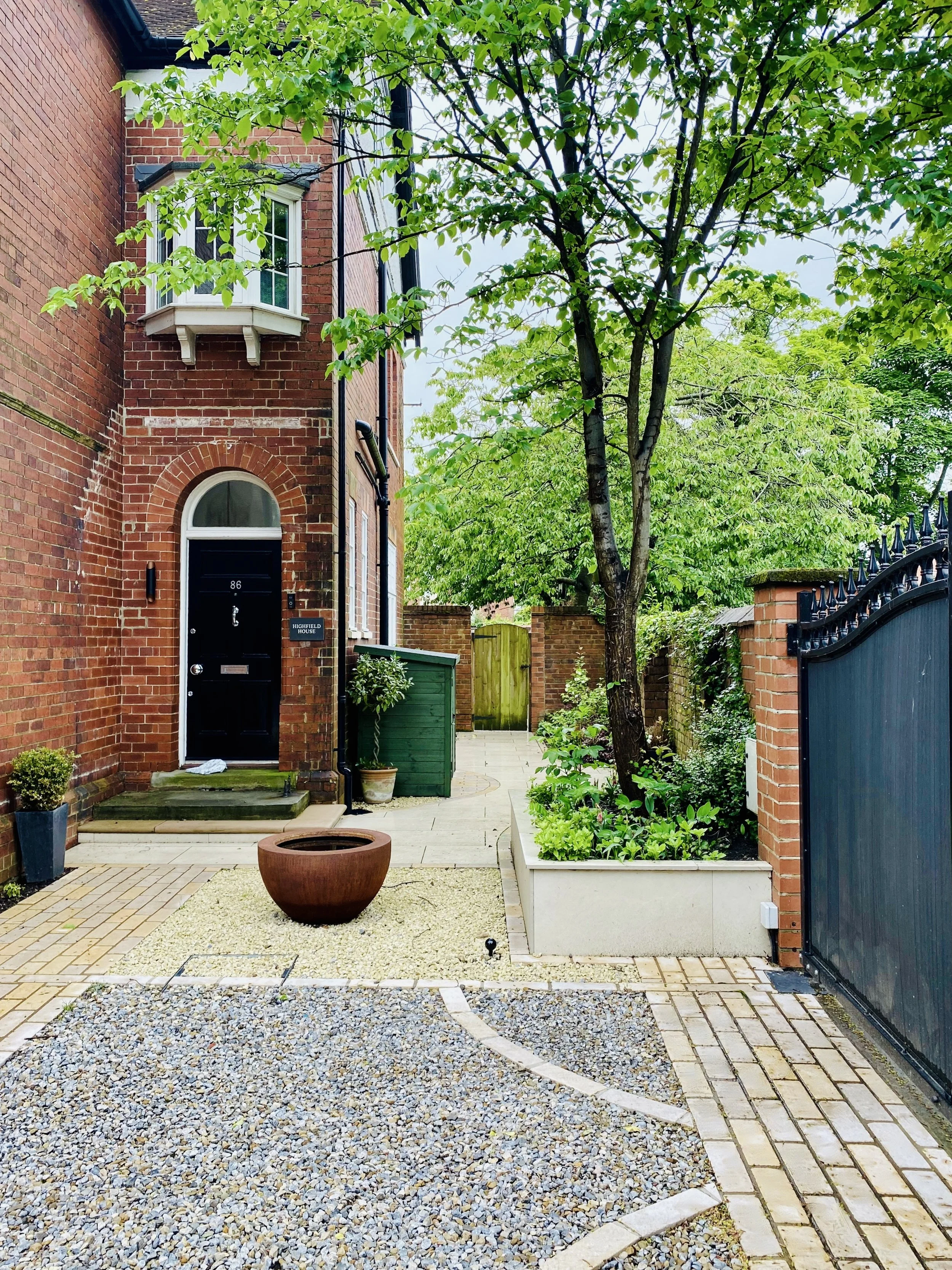 A photograph showing the entrance to the house 