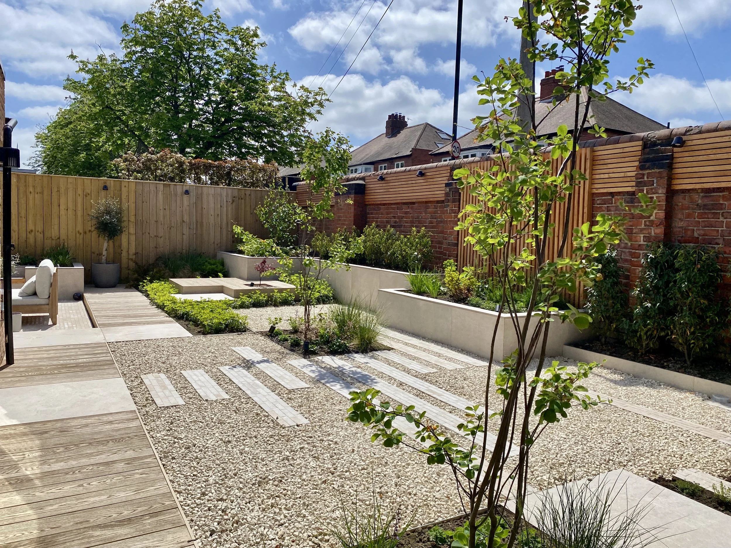 An image showing the sunny courtyard garden