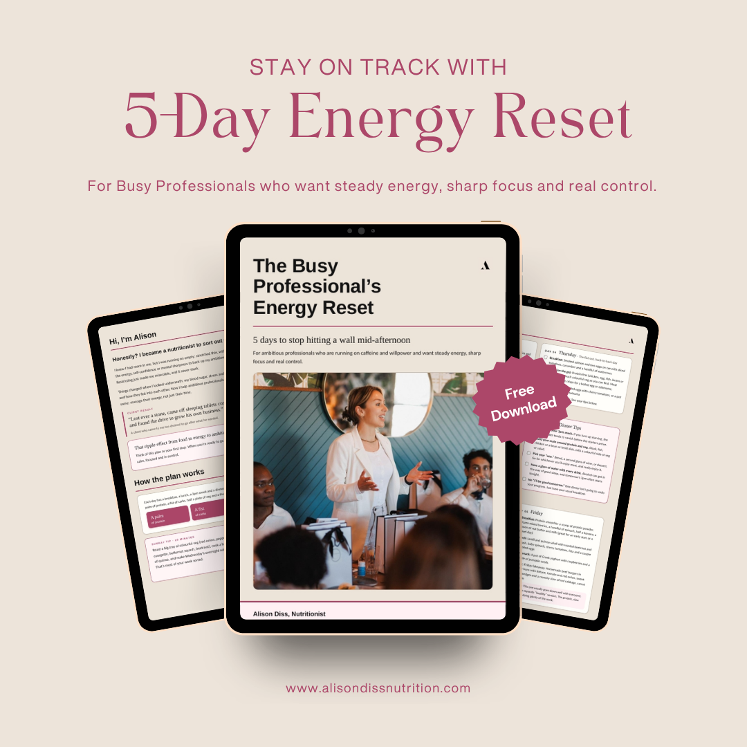 Promotional graphic advertising a free downloadable guide titled '5-Day Energy Reset' for busy professionals, featuring a tablet displaying the guide's cover with a woman speaking to a group, and additional pages of the guide in the background.