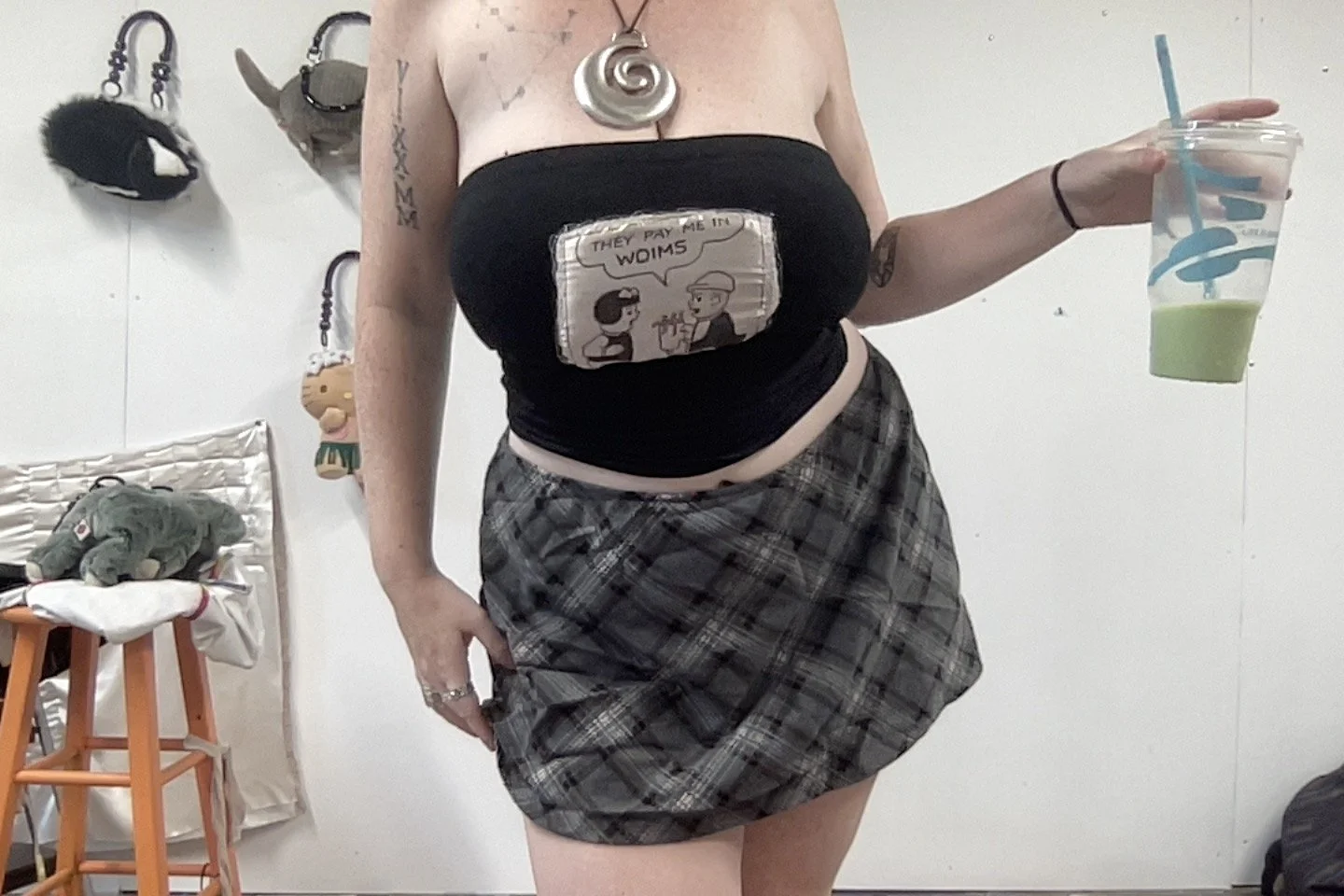woims top