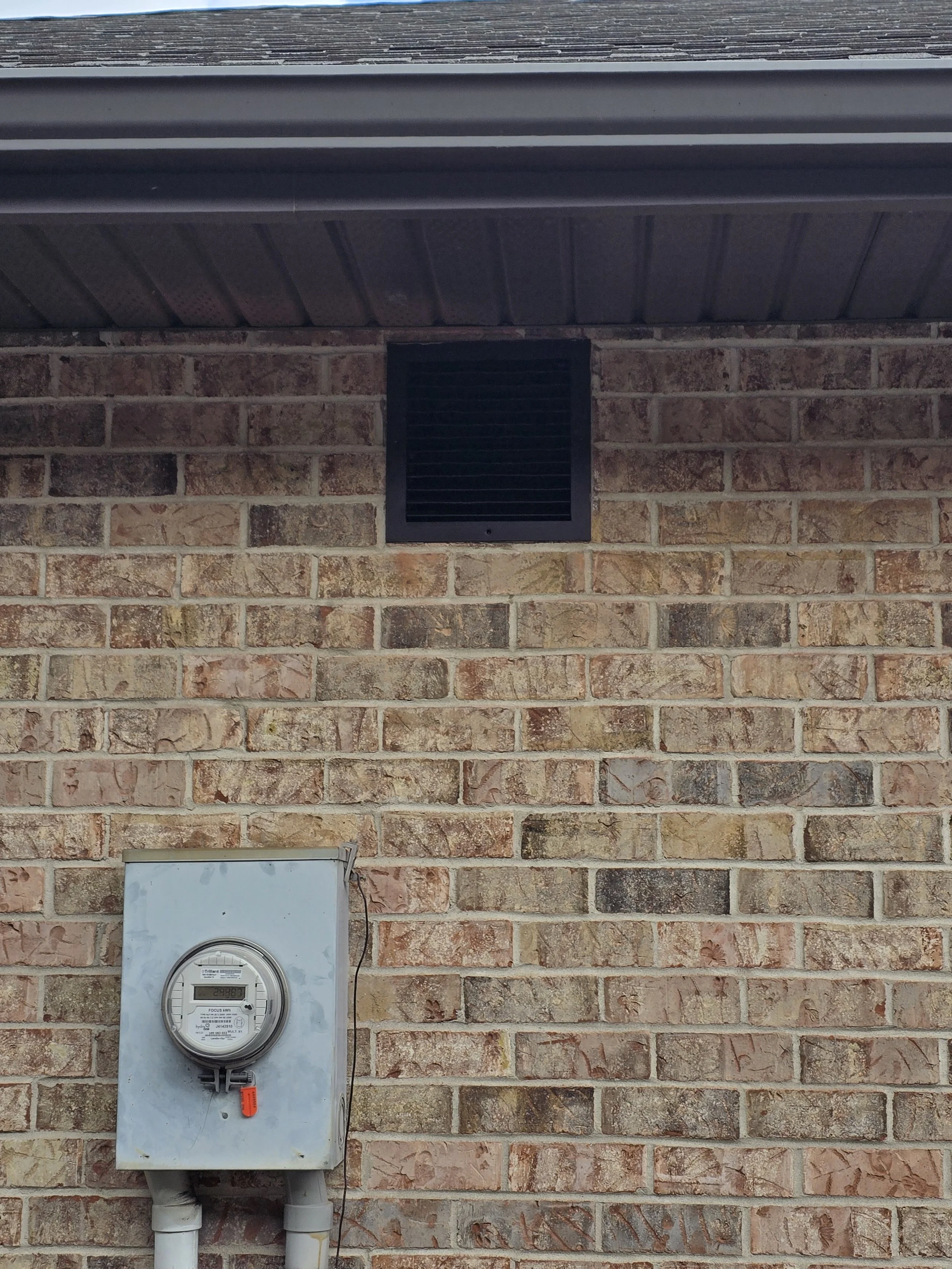 Picture showing Hi-tech exhaust fan installed to control moisture problems in attached garage