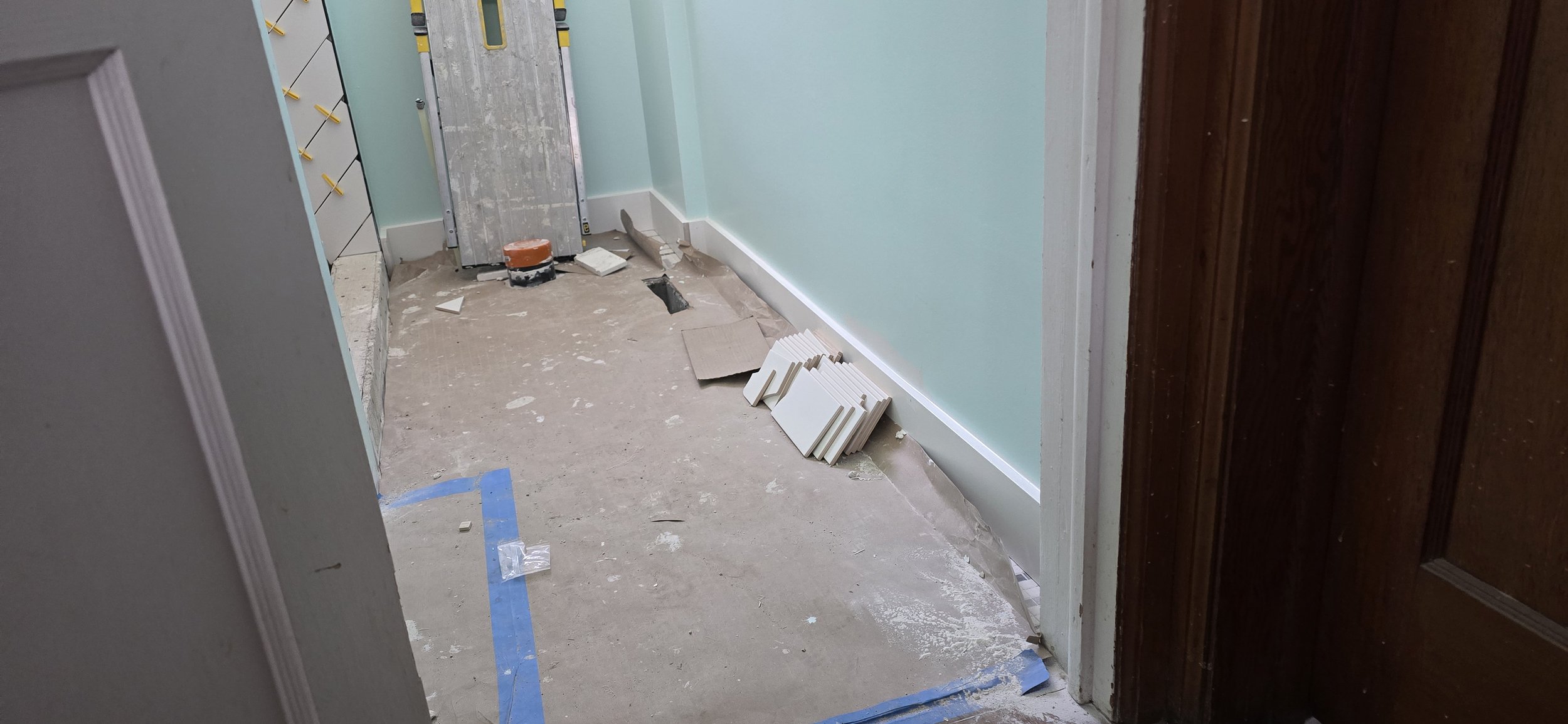 Flooring removed, Walls painted and New Modern Baseboard Installed - London Ontario Bathroom remodel