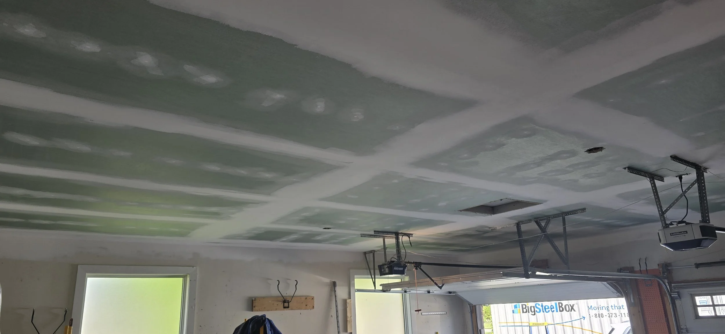 Recently installed moisture resistant drywall in garage Dorchester Ontario - mold remediation