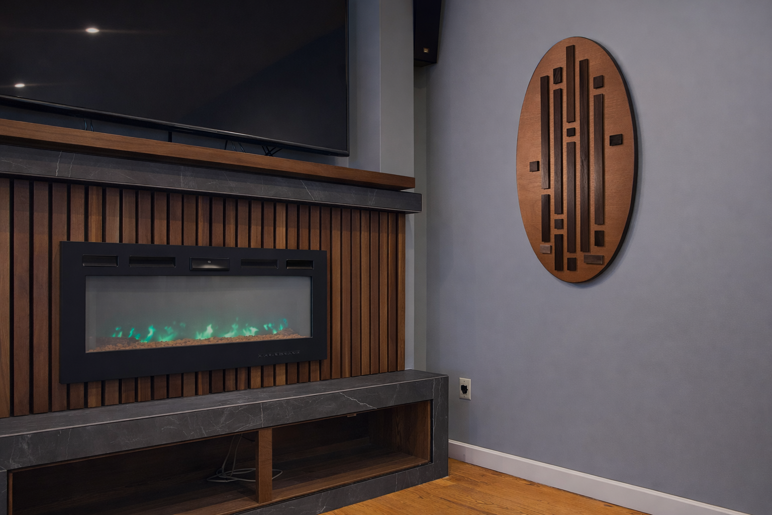 Picture shows custom Black Walnut and Slate Tiled entertainment center, with custom artwork by Steve @ PeckhamPro