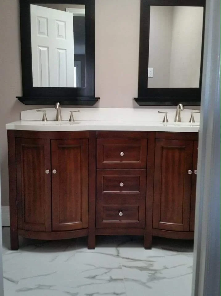 Solid wood double bathroom vanity with quartz countertop, dual mirrors, and brushed nickel faucets.