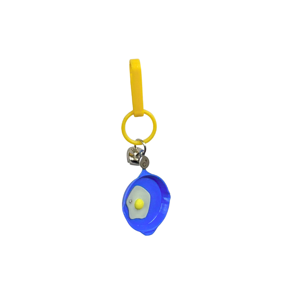 egg in a pan charm.png