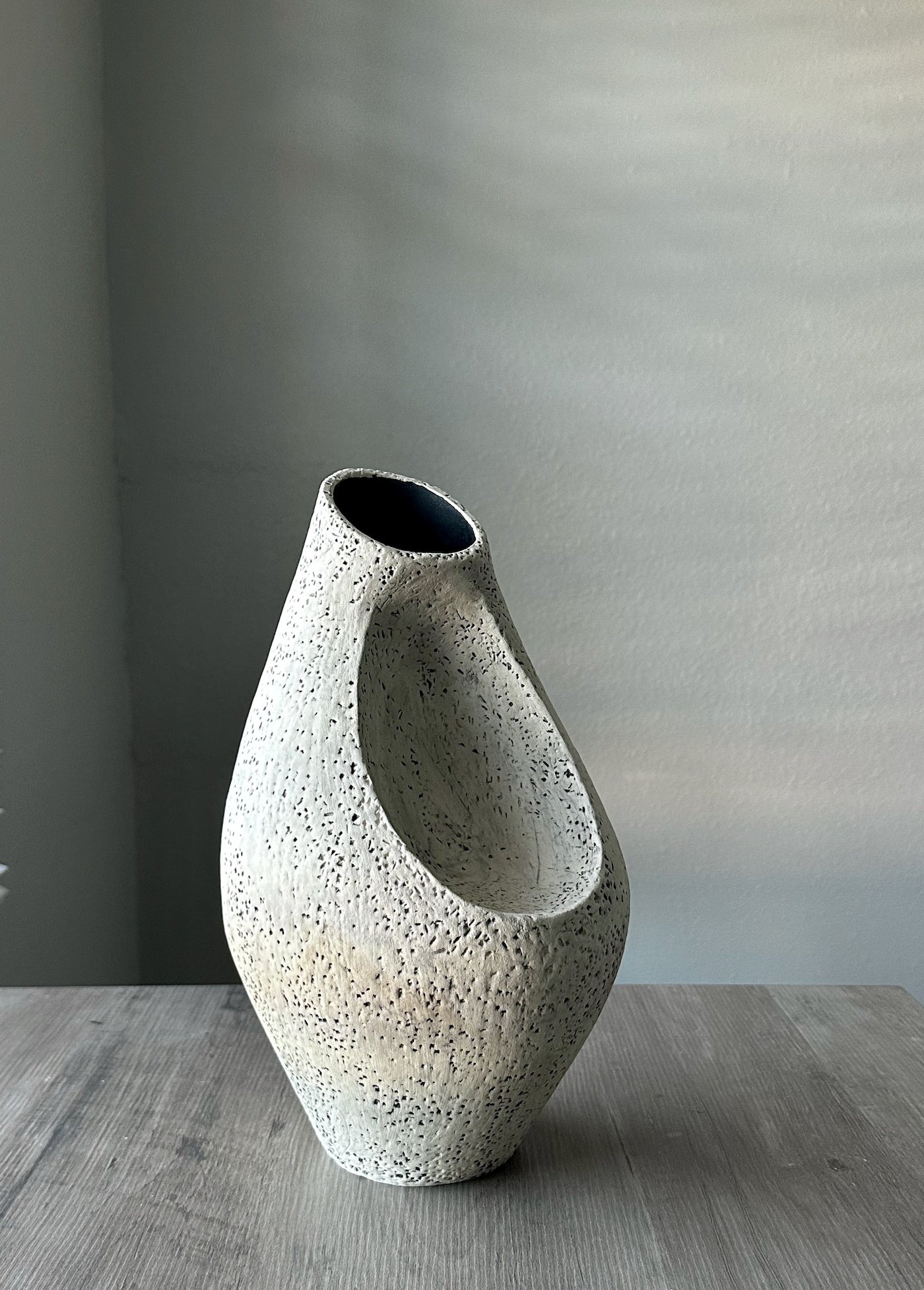 Untitled #1. Hand built stoneware with underglaze. Height 12 in. Diameter 7 in.