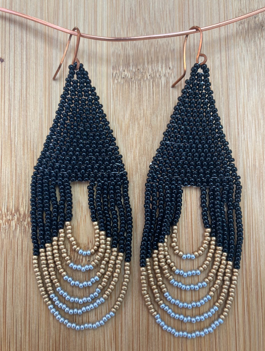 Elegant Black, gold and silver beaded teardrop earrings