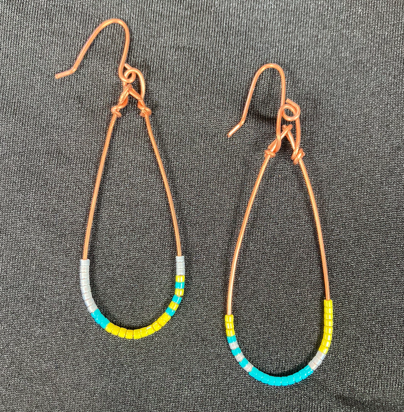 Asymmetric beaded hoops