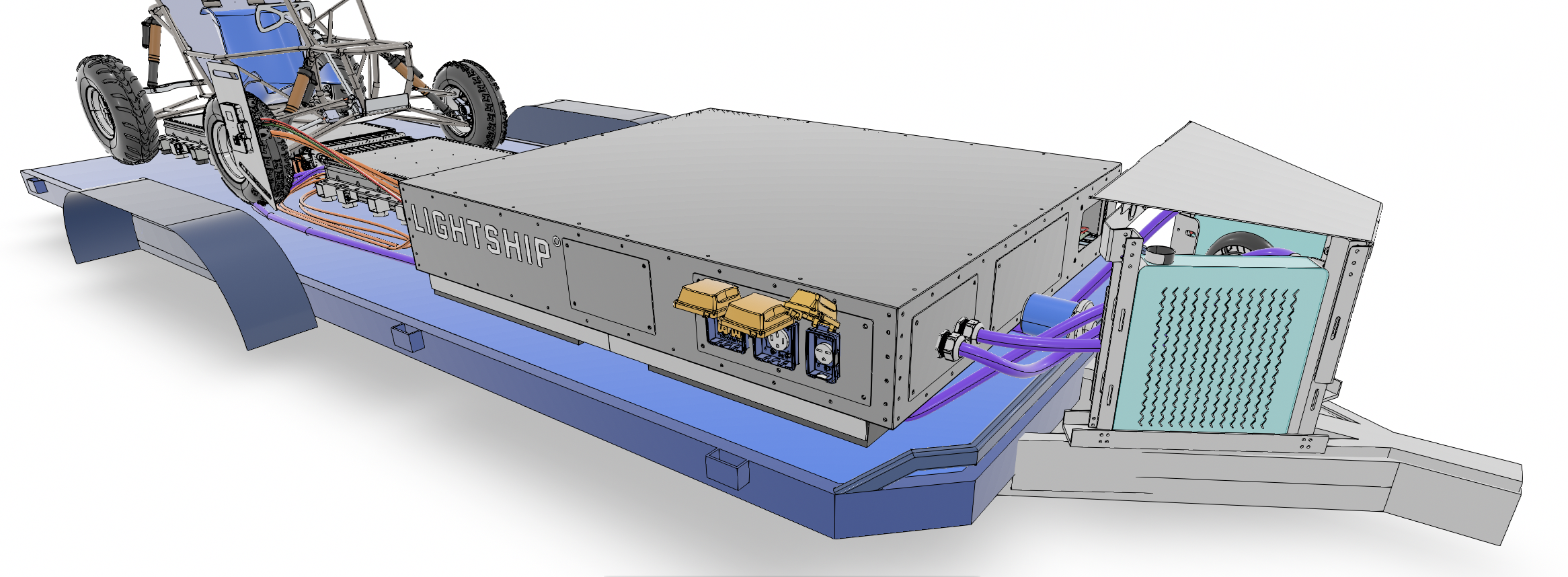 Enclosure I designed, had outlets for V2L, allowed for thermal lines to come in and out, and then off in the distance there you see the Baja SAE car that drove the height requirement for the solar canopy.