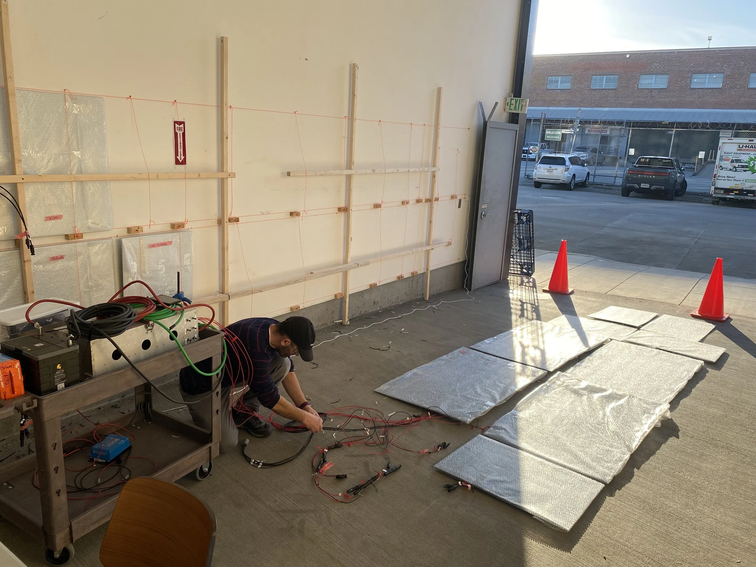 Wiring up the panels that will go on the alpha vehicle