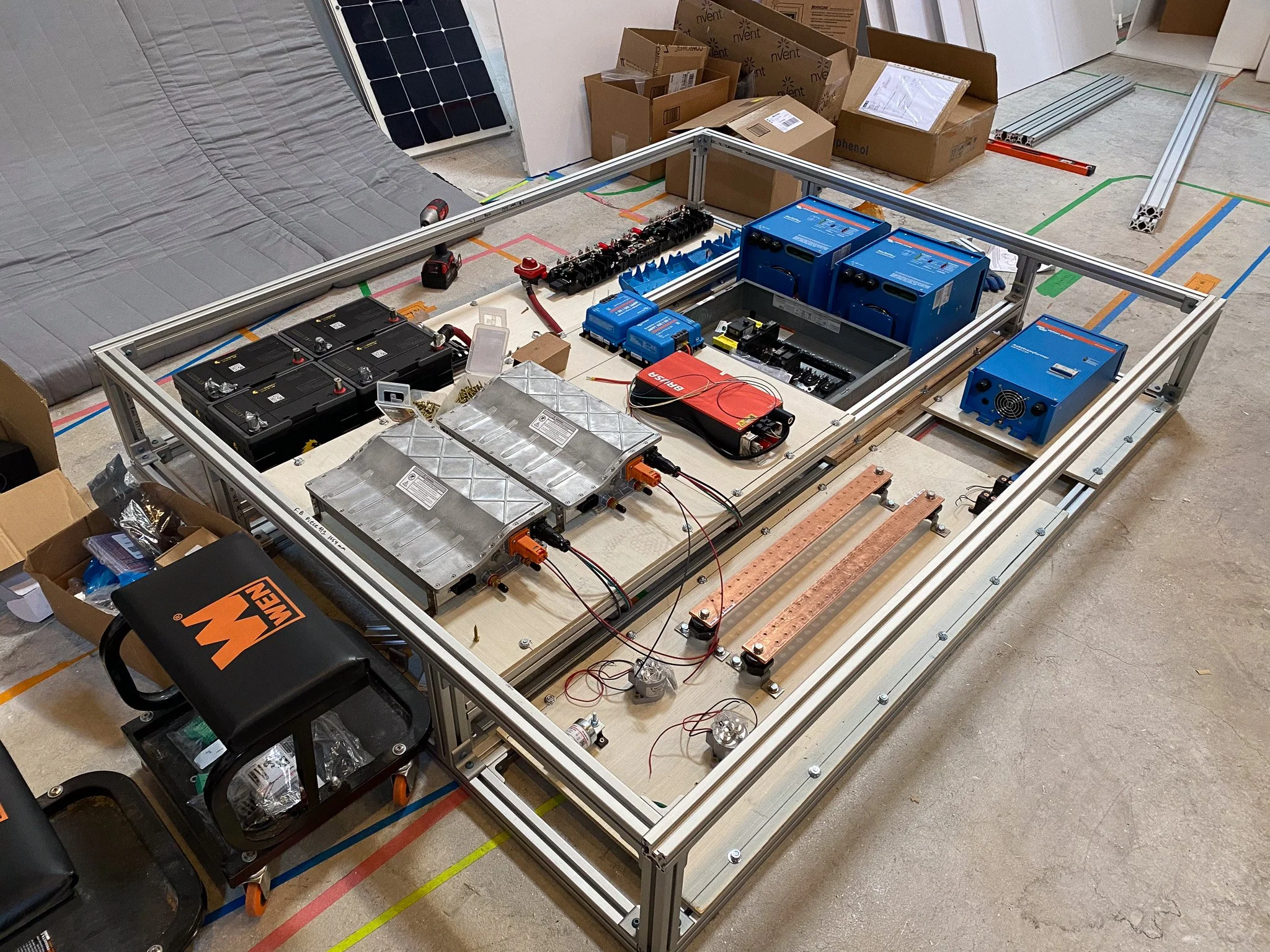 Beginnings of the enclosure's layout, I built a frame out of 80/20 and then bolted aluminum panels to the sides, top and bottom.