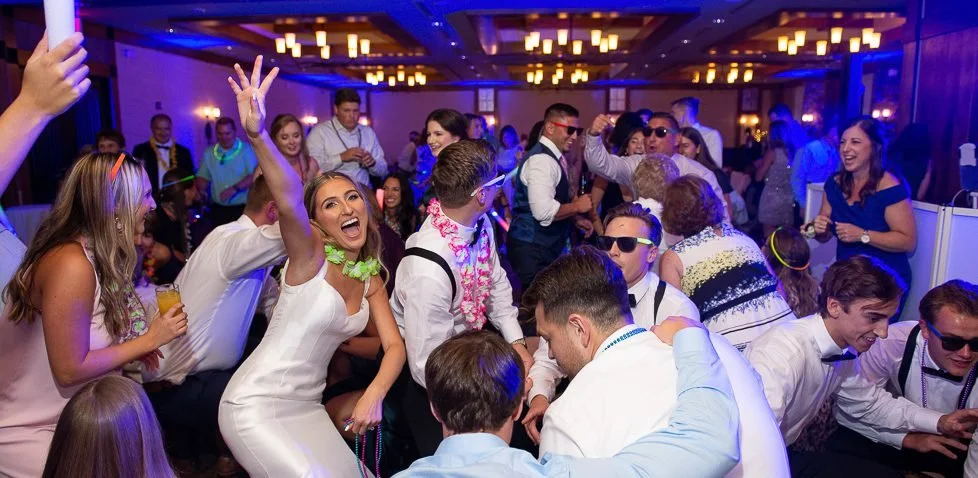 011-Wedding-Party-Celebrate-By-Dancing-At-Reception-With-Fun-Lehigh-Valley-Lights-And-Uplighting.jpg