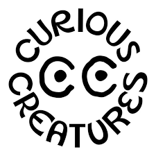 Logo with the words 'Curious Creatures' surrounding two stylized letter 'C's resembling eyes.