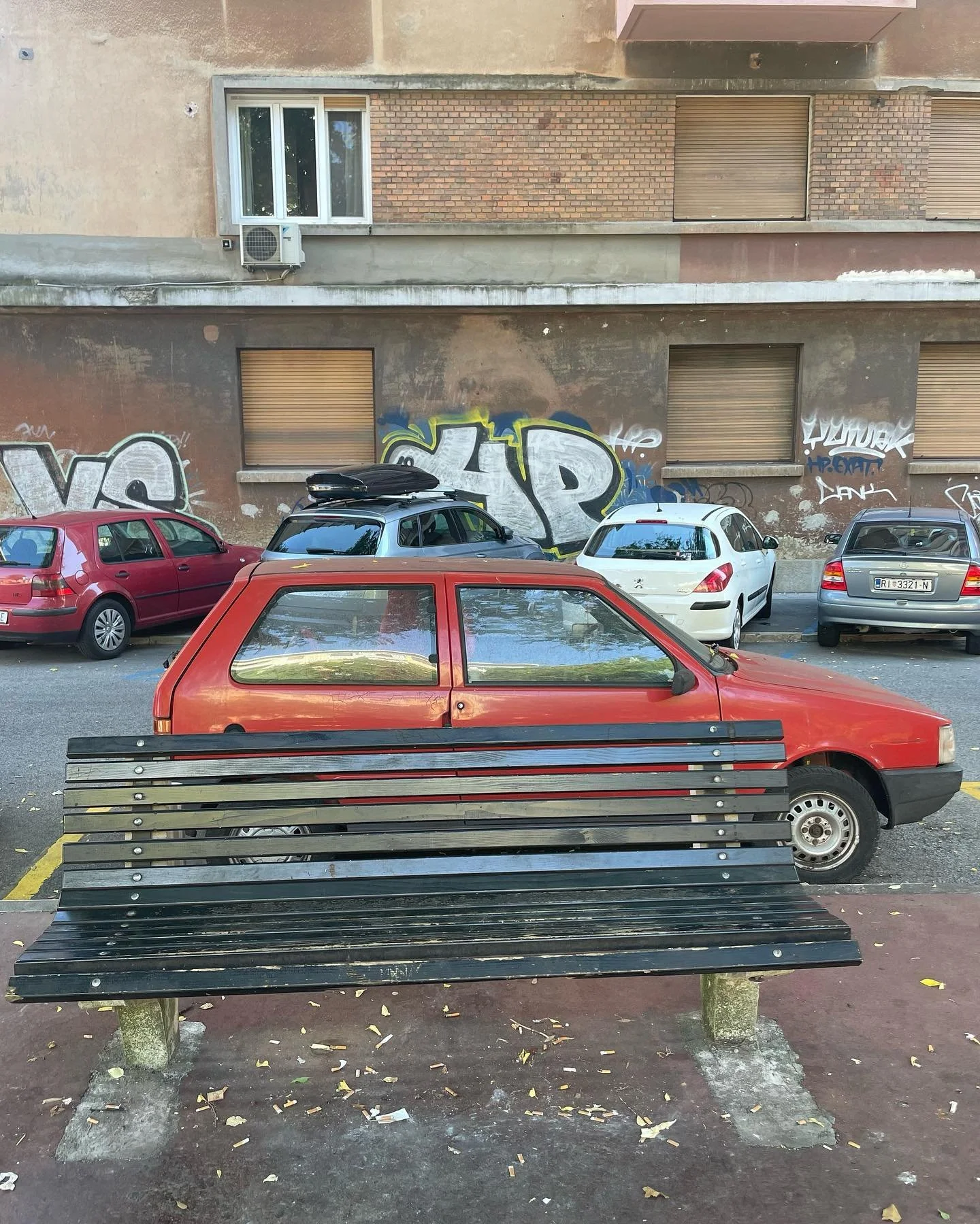 Some cars….. and a bench