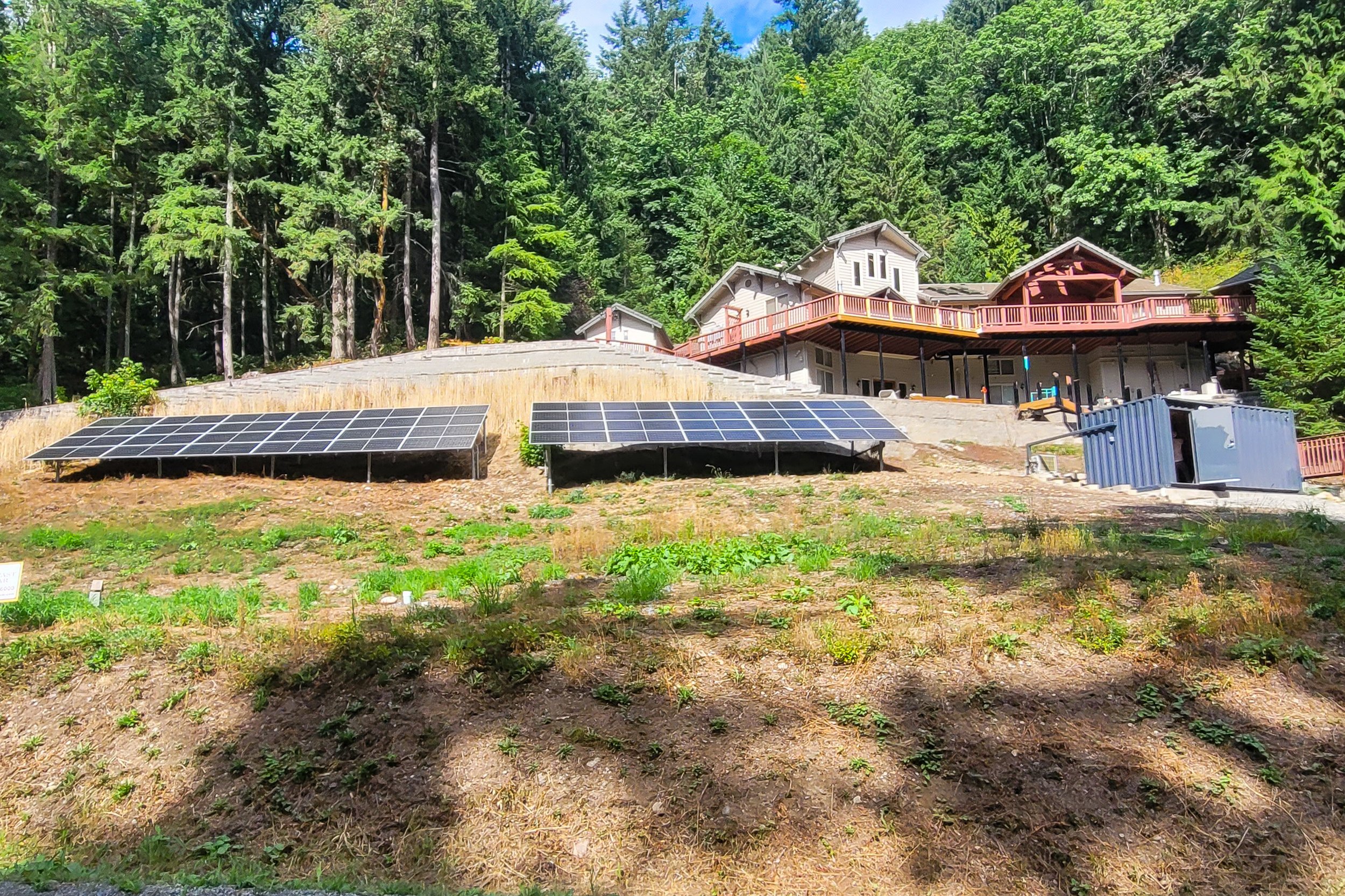 Large Ground-Mounted Array in New Castle, Washington backed up with Sol-Ark 15k Limitless Inverters and EG4 Storage.