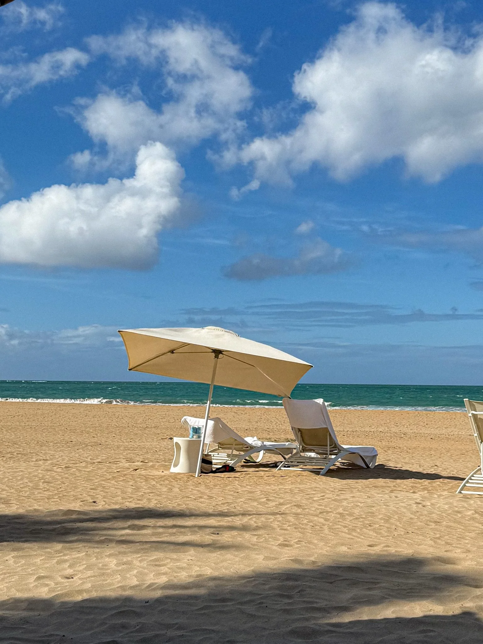 four-seasons-puerto-rico-beach-chairs-umbrella-2.jpg