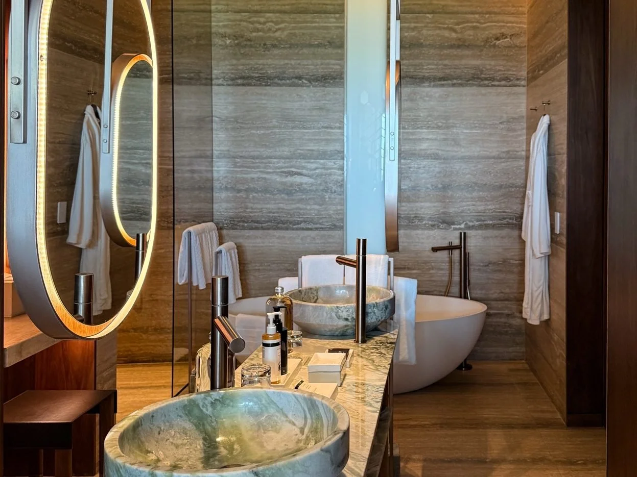 st-regis-kanai-bathroom-marble-soaking-tub.jpeg