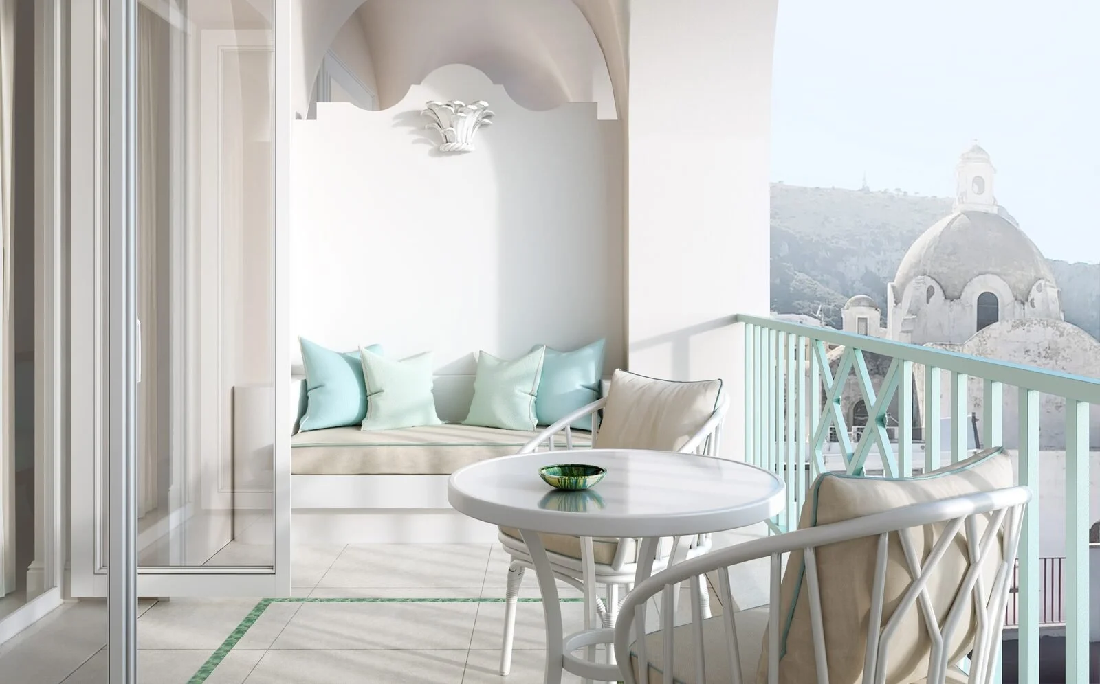 Private terrace at Hotel La Palma Capri with a built-in banquette, table and view over the rooftops of Capri town