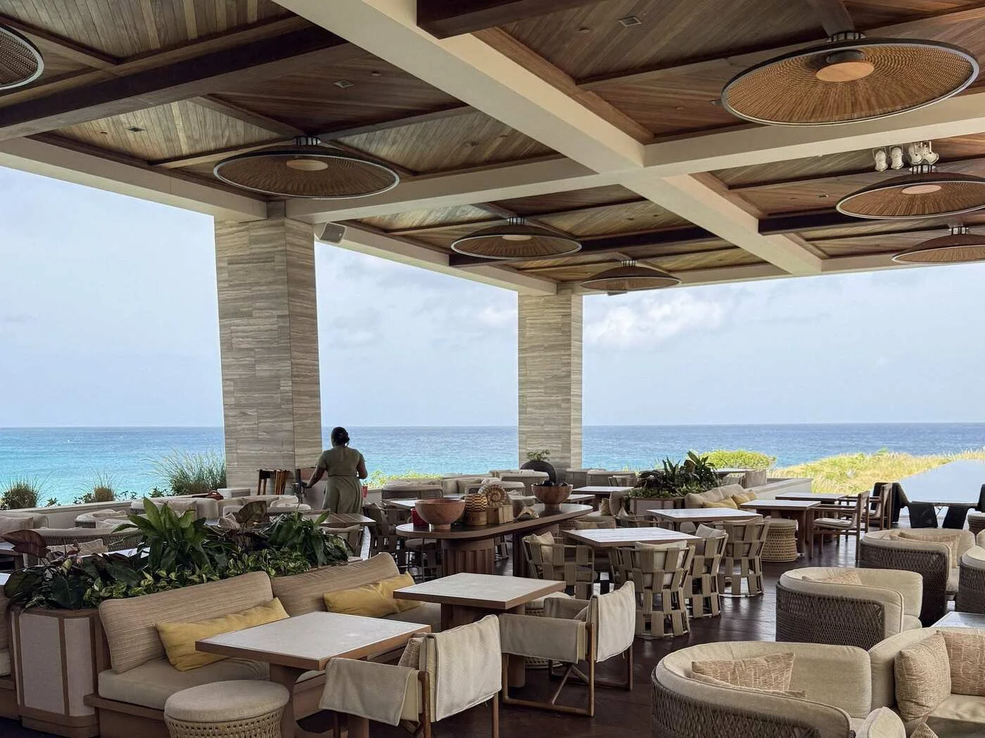 SALT restaurant at Four Seasons Anguilla with open-air dining and panoramic ocean views