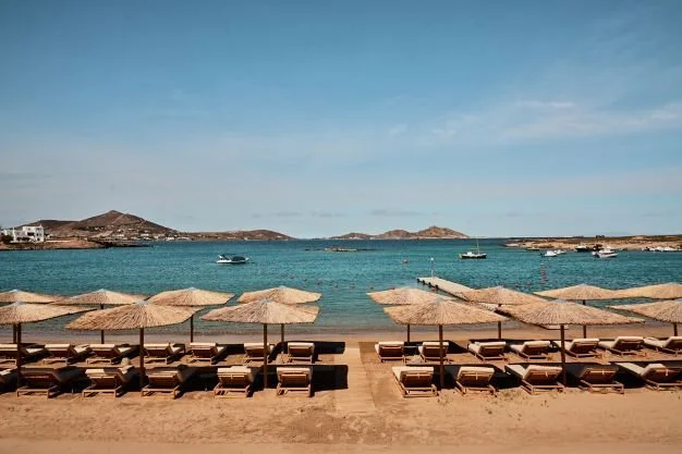 Cosme Paros beach umbrellas and loungers