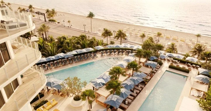 Pools, cabanas and the Gulf of Mexico beachfront at Naples Beach Club, A Four Seasons Resort