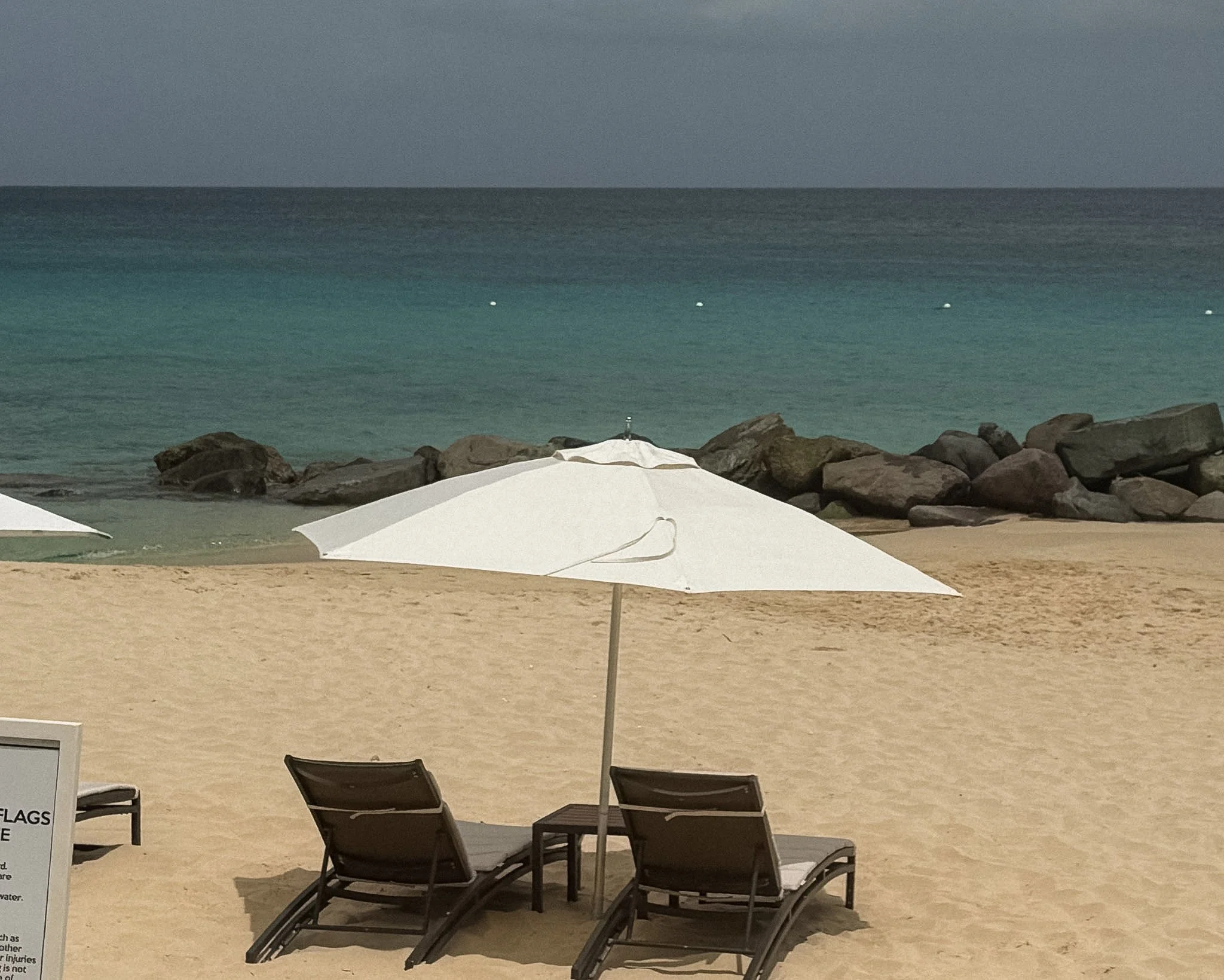 Rocky shoreline and turquoise water at Barnes Bay near Four Seasons Anguilla